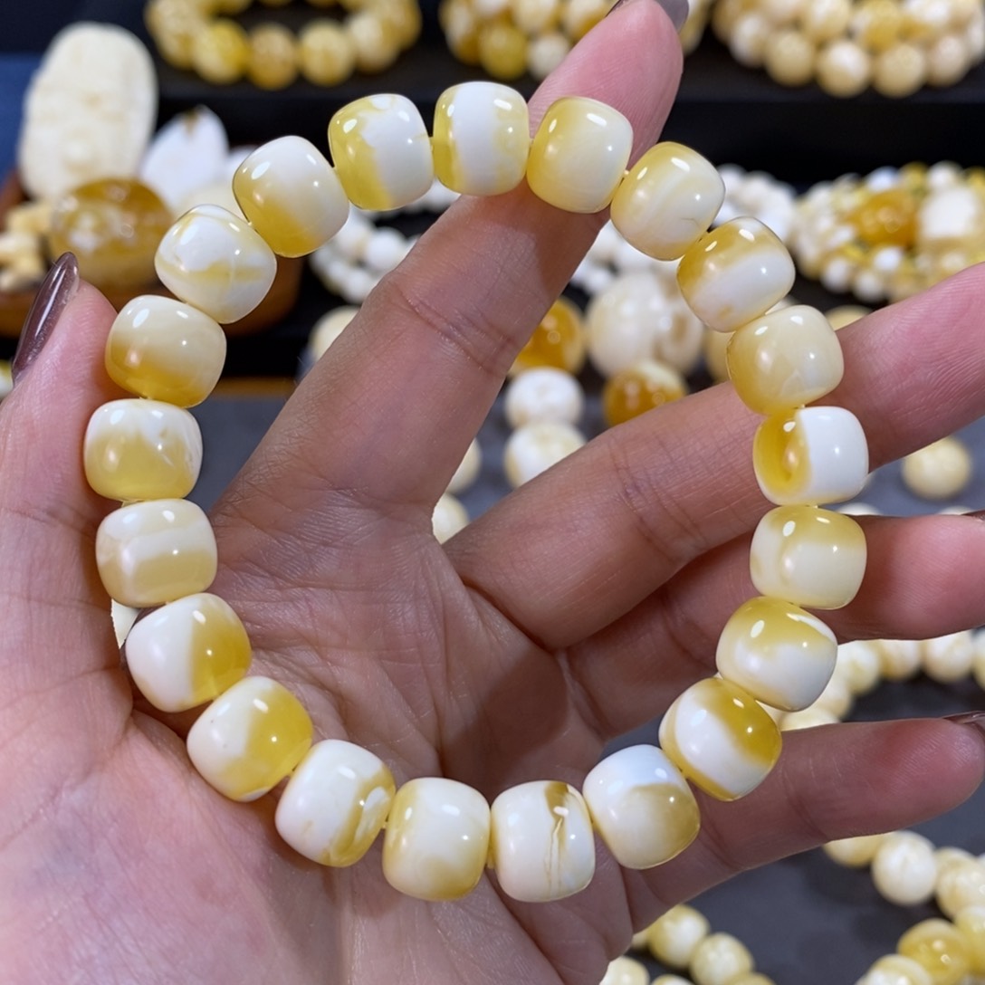 蜜蜡手串未镶嵌11.2mm金瓷白妖花溶洞手串