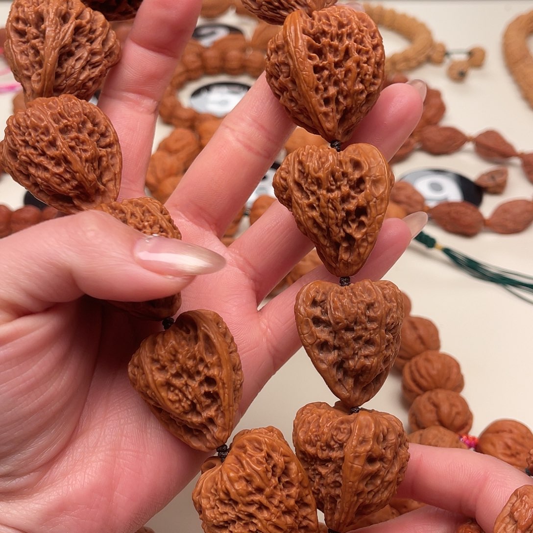 机***生文玩核桃吊坠南疆石手持