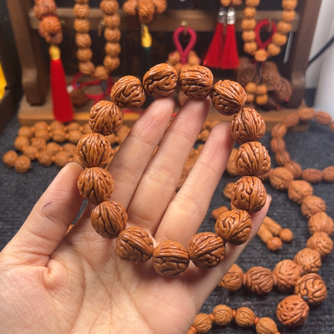 星****吊坠桃核桃枭手串L4