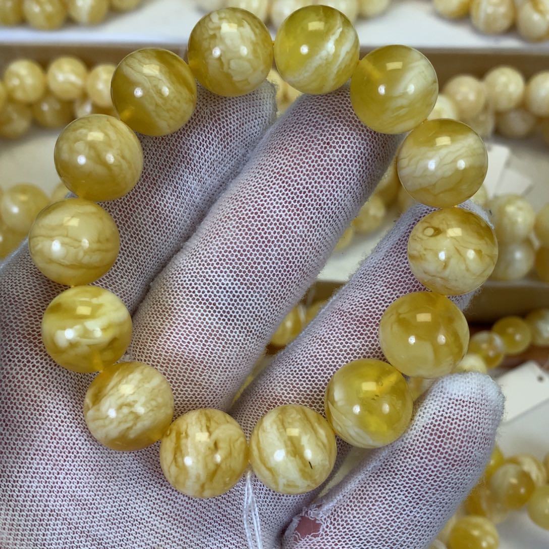 蜜蜡未镶嵌手串25.7克 14m 金白虎皮