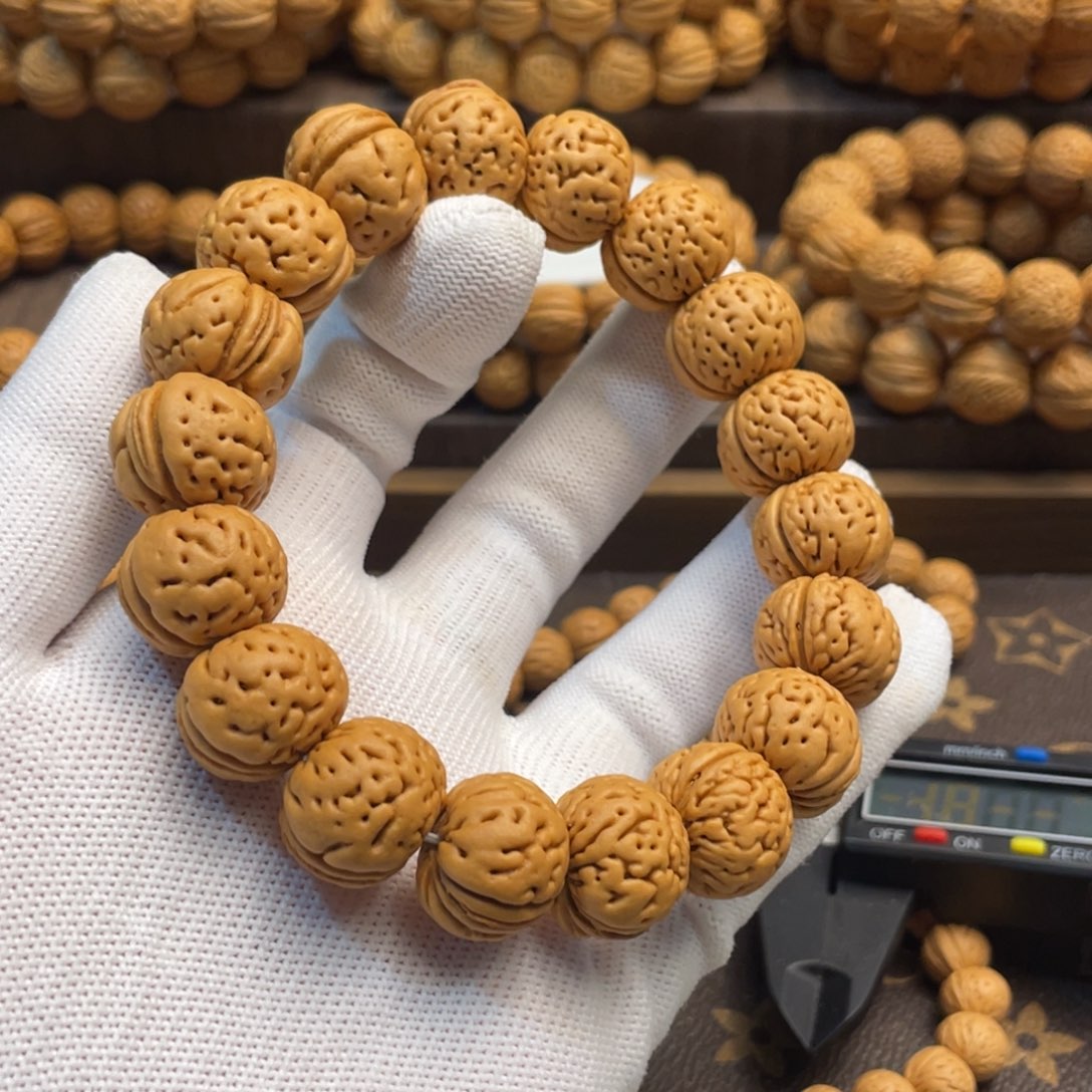 手串桃核月**清野生肌肉奶豆