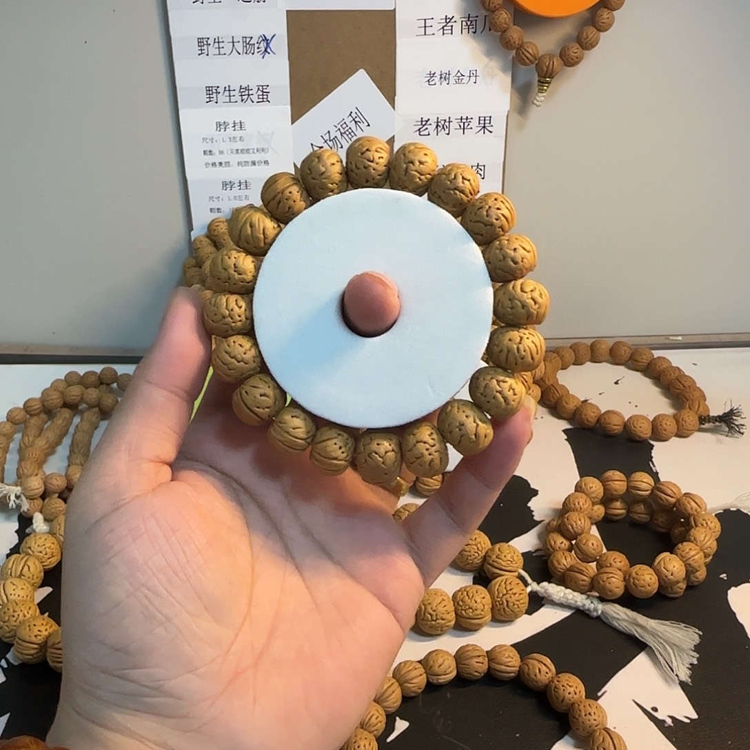 涛***子桃核吊坠树王纽扣