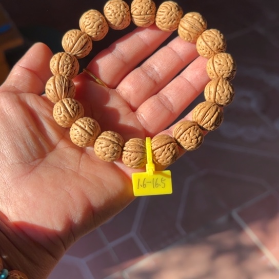 哈***a木质野生桃核手串