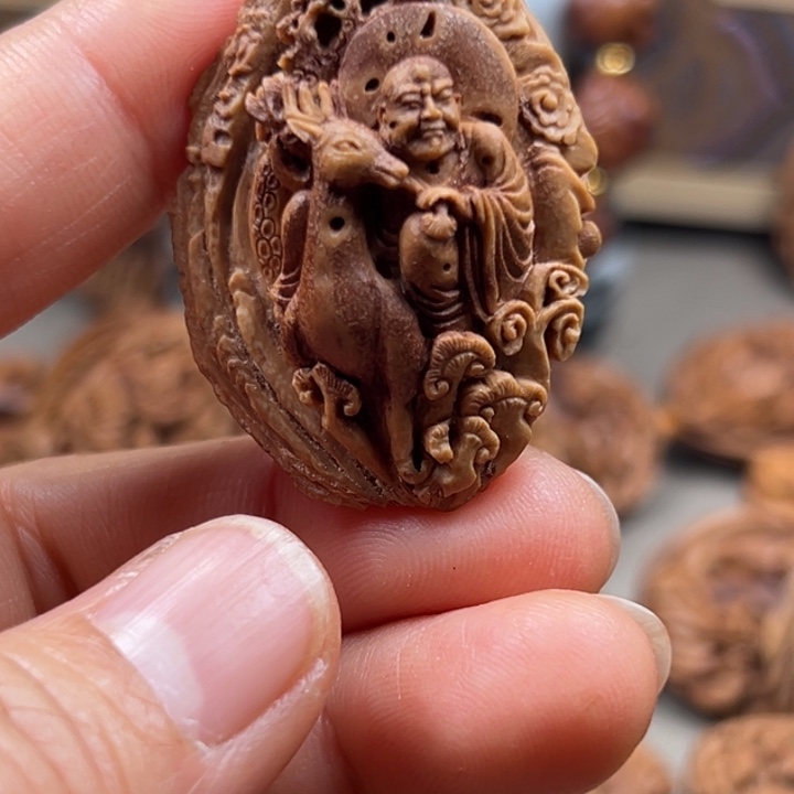 桃核手串王****川桃核雕刻坐禄罗汉