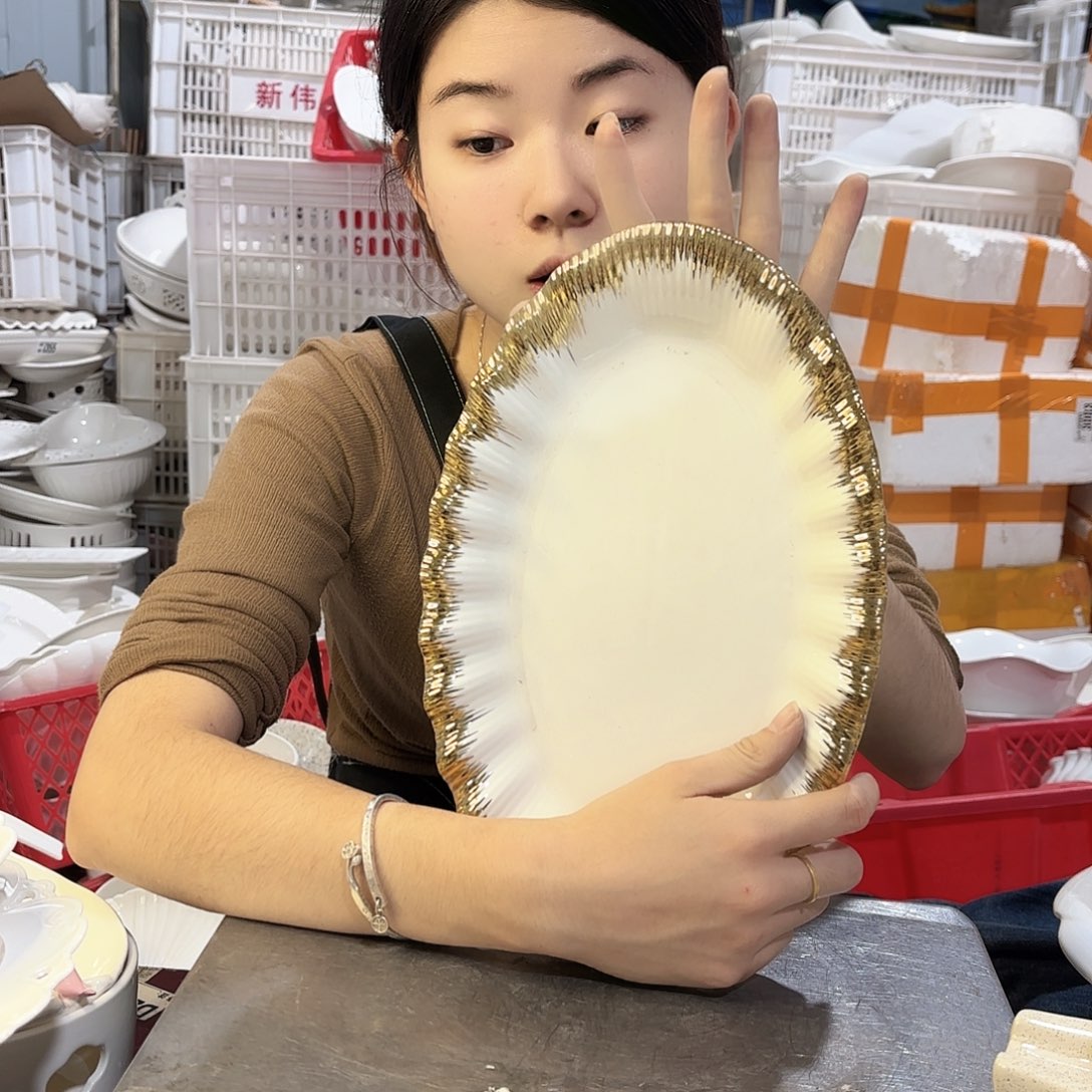 盘微瑕产品………浪花鱼盘一个加金