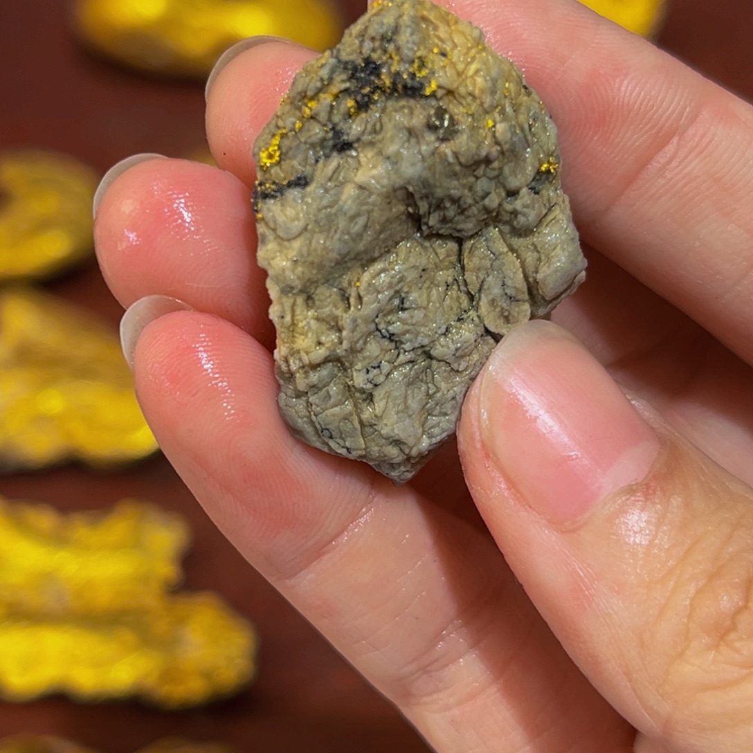 自***翔石材明金矿约14.5克