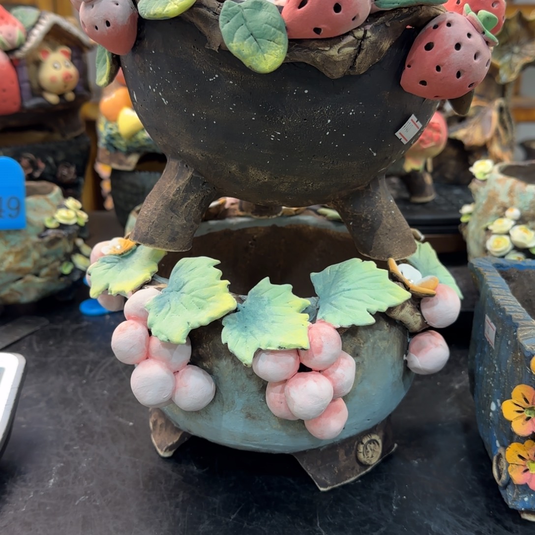 刘***.本默花器麦饭石花盆