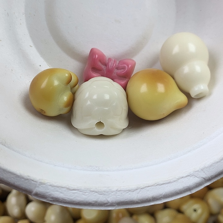 唐***唐菩提根/象牙果吊坠象牙果瑕疵混搭5个 不退不换