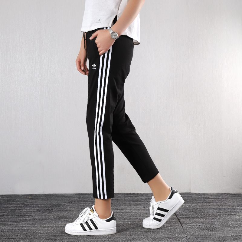 Adidas阿迪达斯三叶草女黑秋季运动裤健身训练跑步针织长裤FL0047