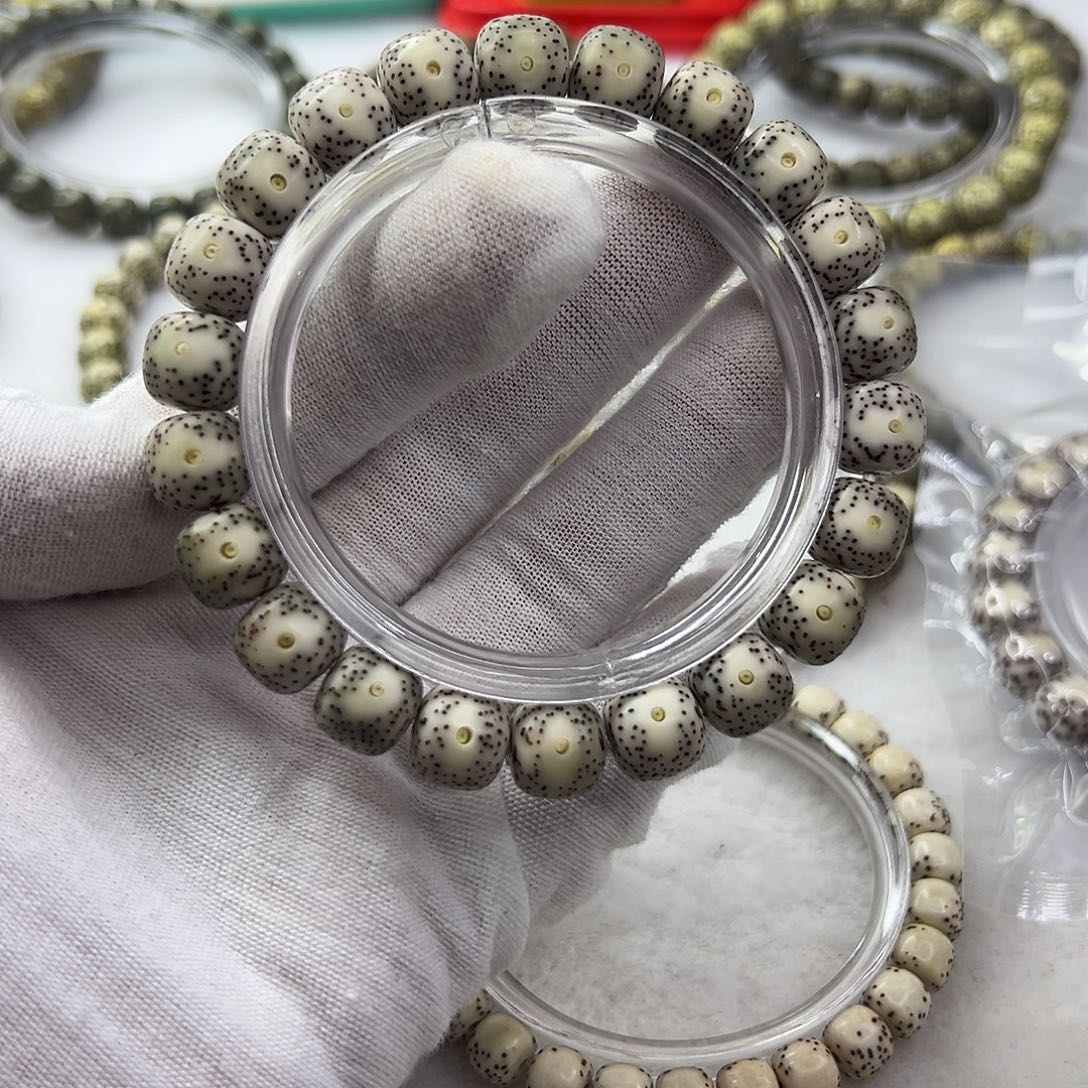 手串星月菩提10×9灰包白丹凤眼  41