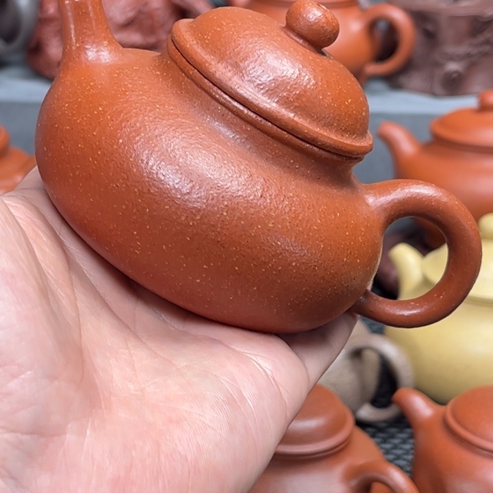 紫砂茶壶菠***?紫砂艺术茶具套装红降坡