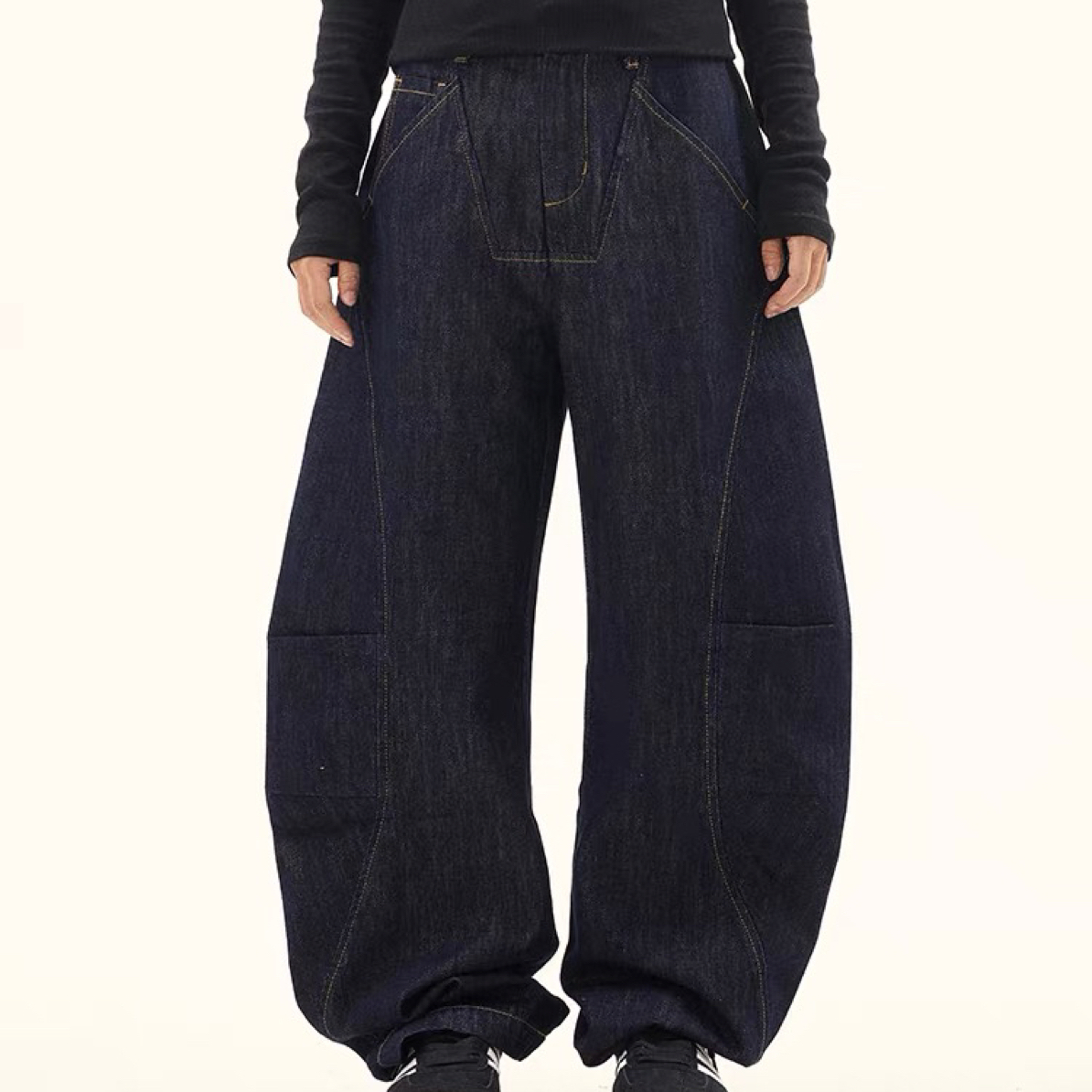 L378设计感压褶纯色牛仔弯刀裤