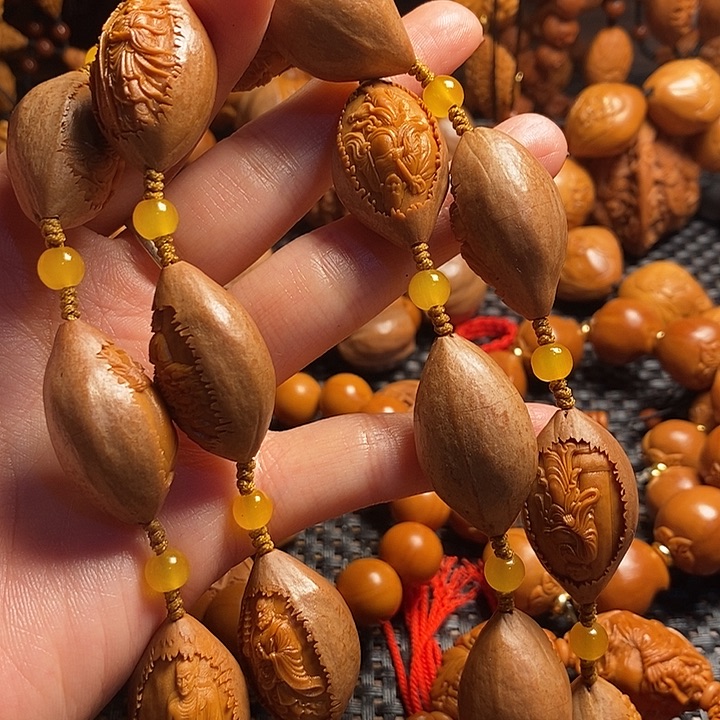 吊坠橄榄核℡****歌包衣罗汉