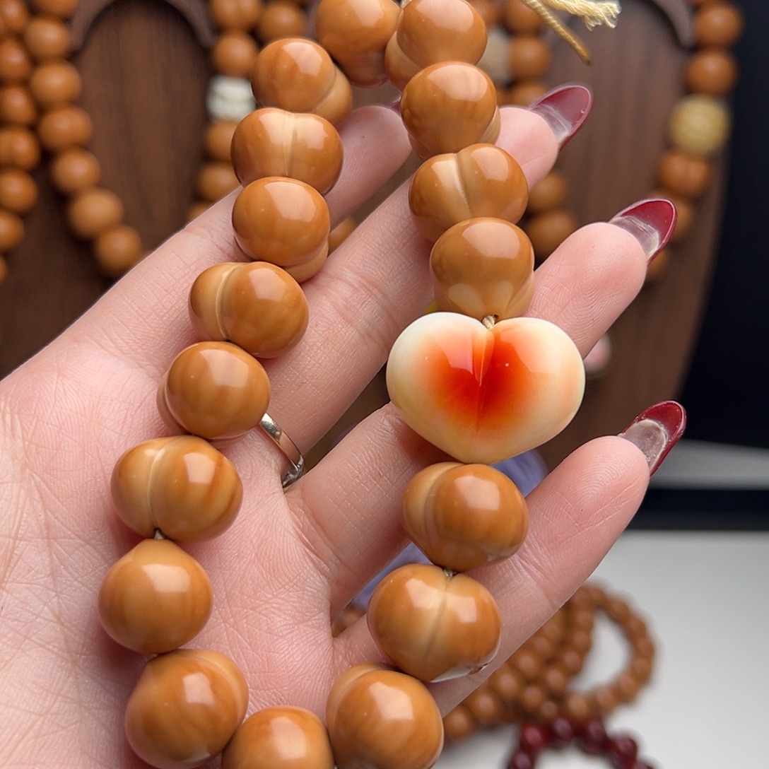 越****猴头核桃吊坠屁桃