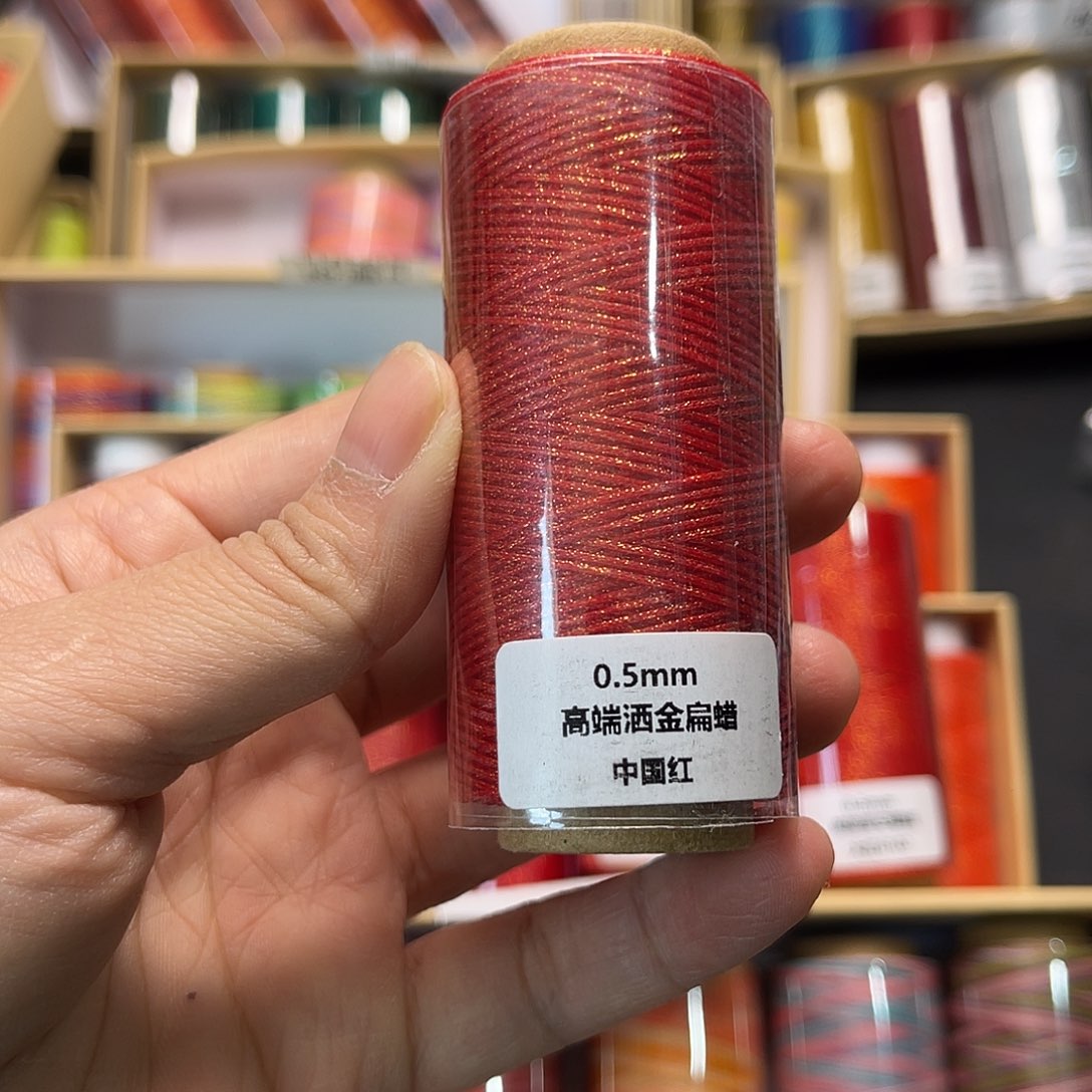 0.5洒金扁蜡中国红20克