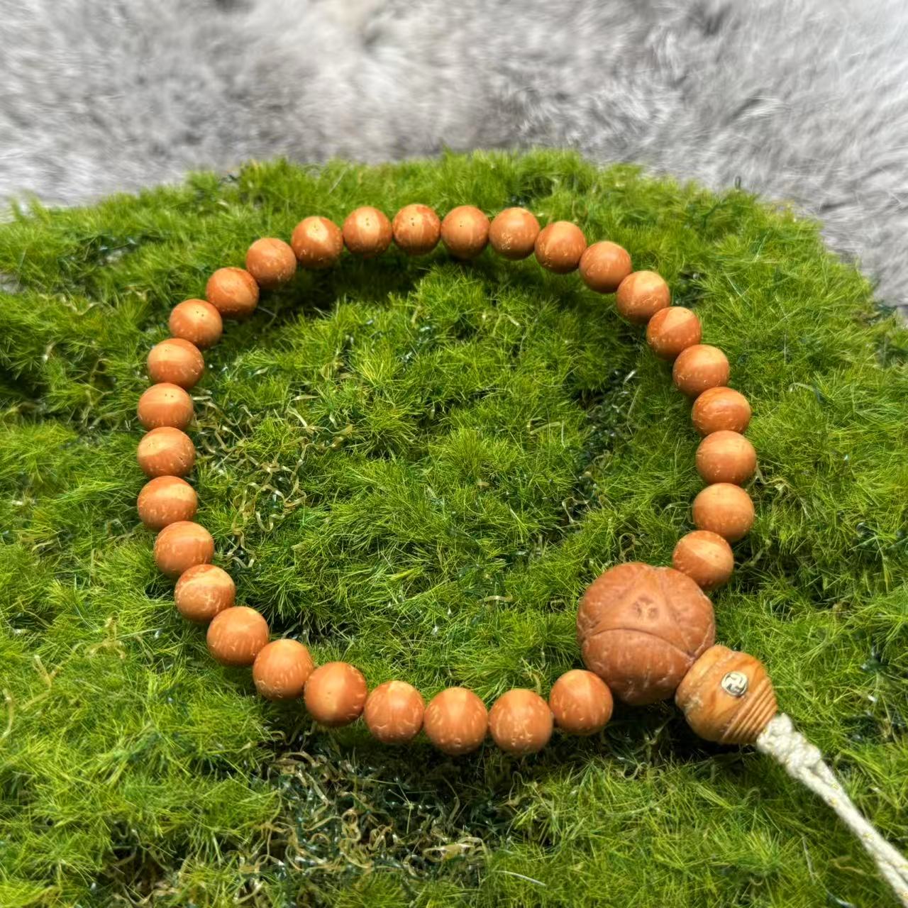 尺寸8mm左右“国产小凤眼”凤求凰酸枣核手持一条《小鱼文玩》