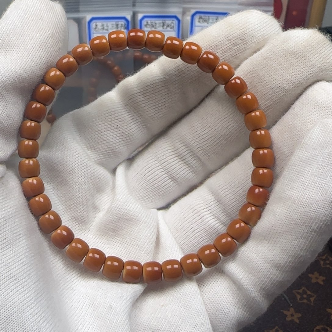 橄榄核手串老挝单圈极限弧三花6.1mm