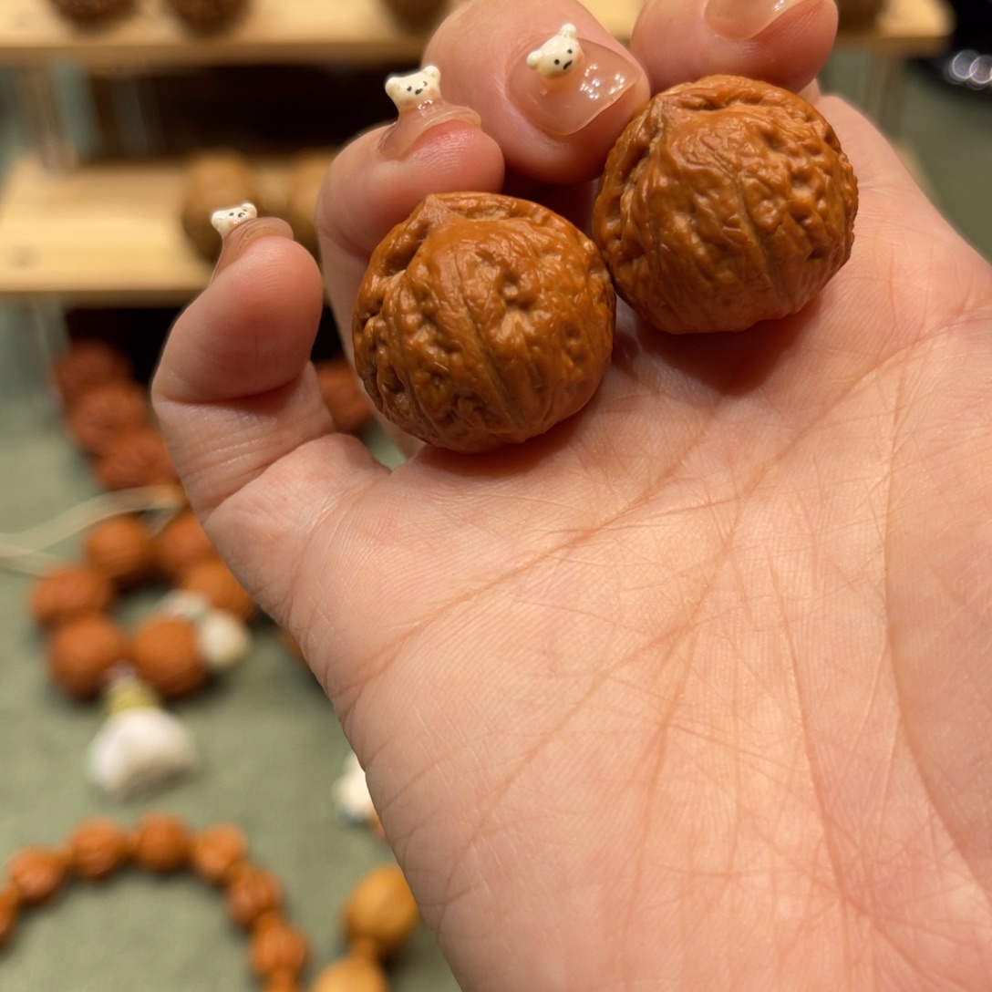 屈***业把件文玩核桃嘎嘣豆孤品