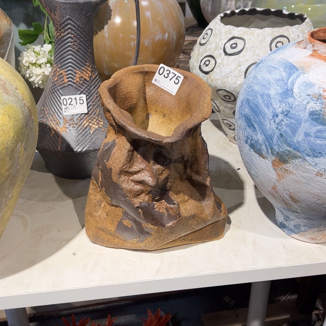 瓷片0375高24瓶口不规则的，