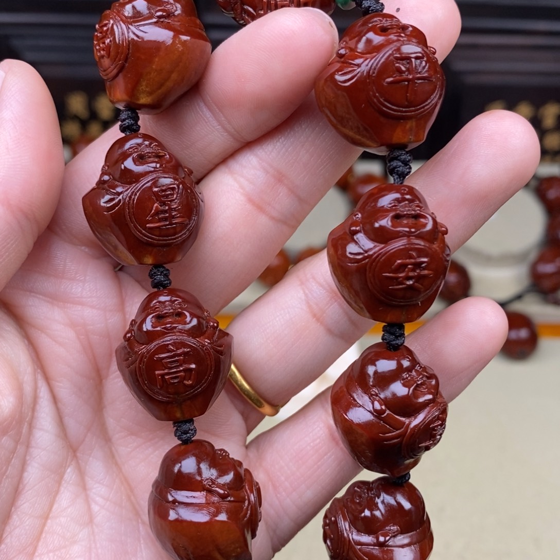 涤***。橄榄核吊坠八宝弥勒