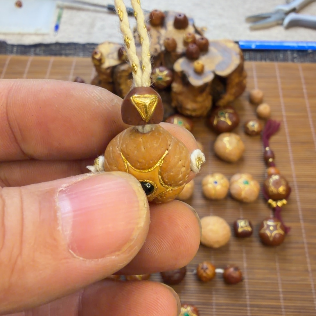 龙眼 镶金佛塔包金