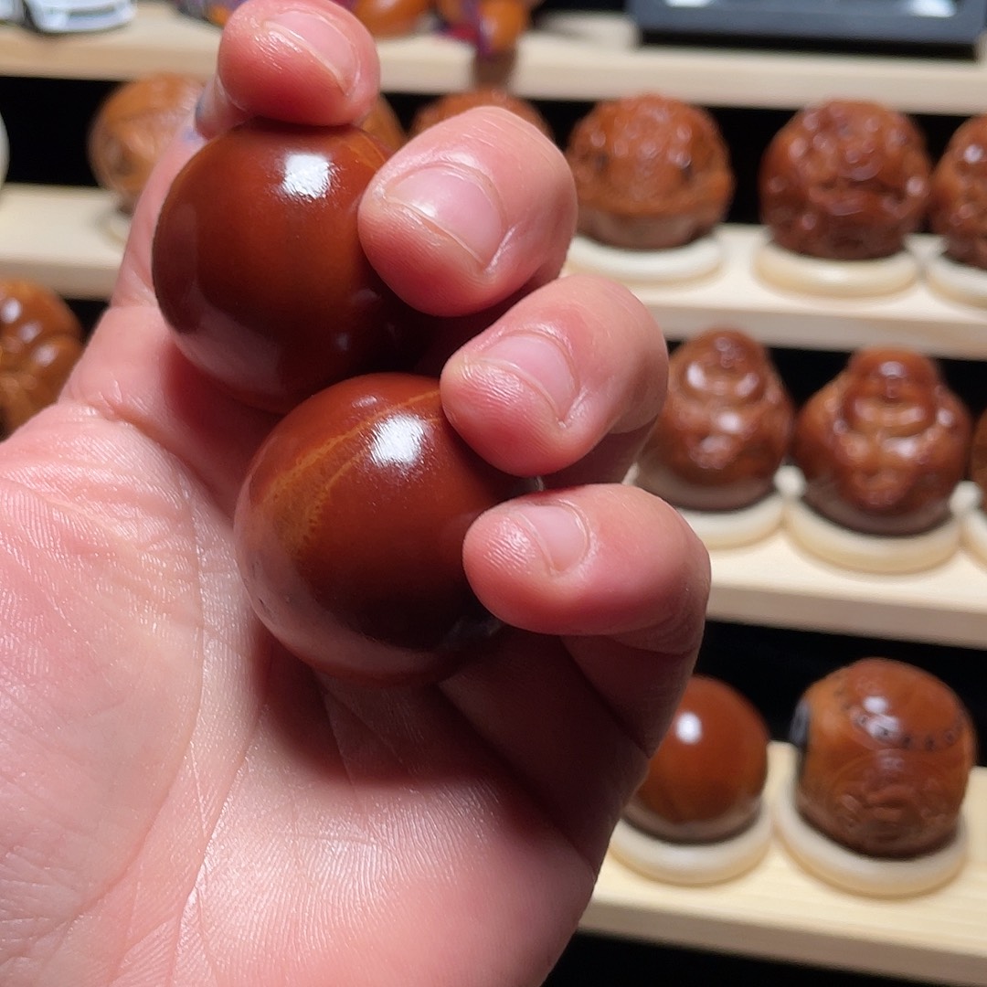 閣***閣橄榄核吊坠光珠3.3