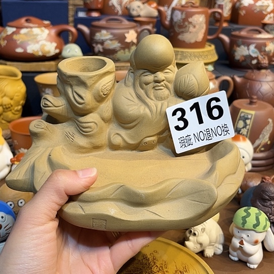 紫砂茶杯泡**?紫砂茶宠