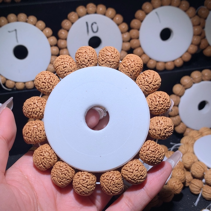 桃核手串正圆龙鳞王