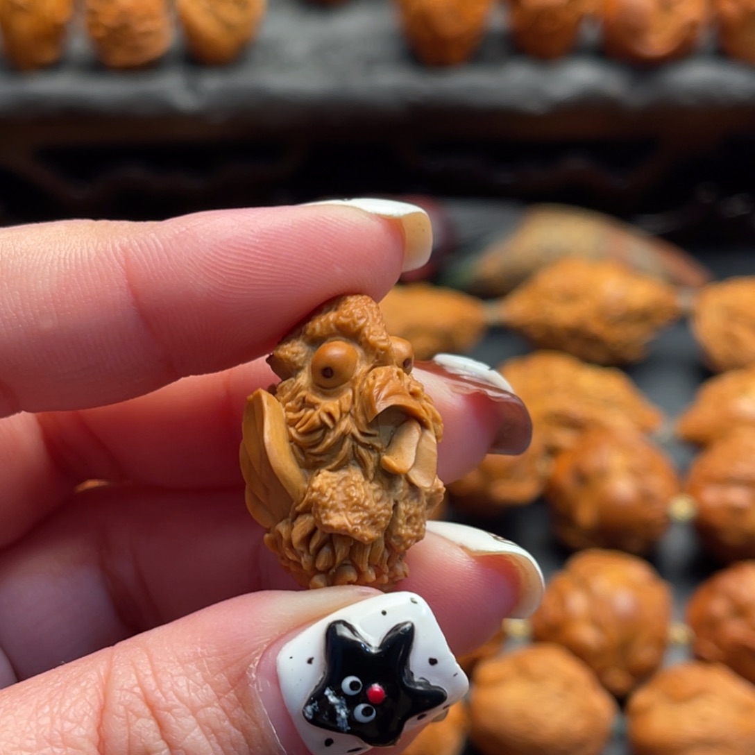 塞***浴橄榄核手串/手链疯癫