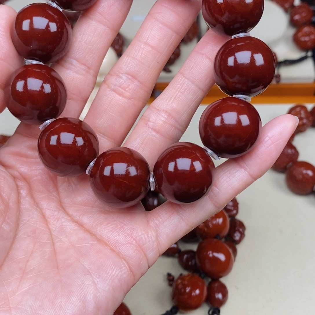 橄榄核吊坠世*人光珠，