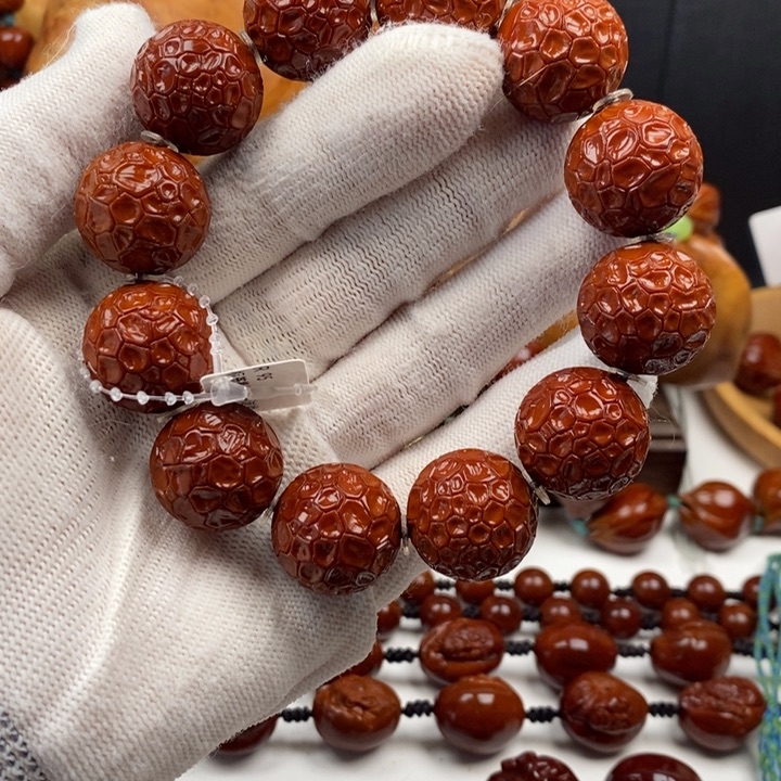 橄榄核手串花**言我想知道