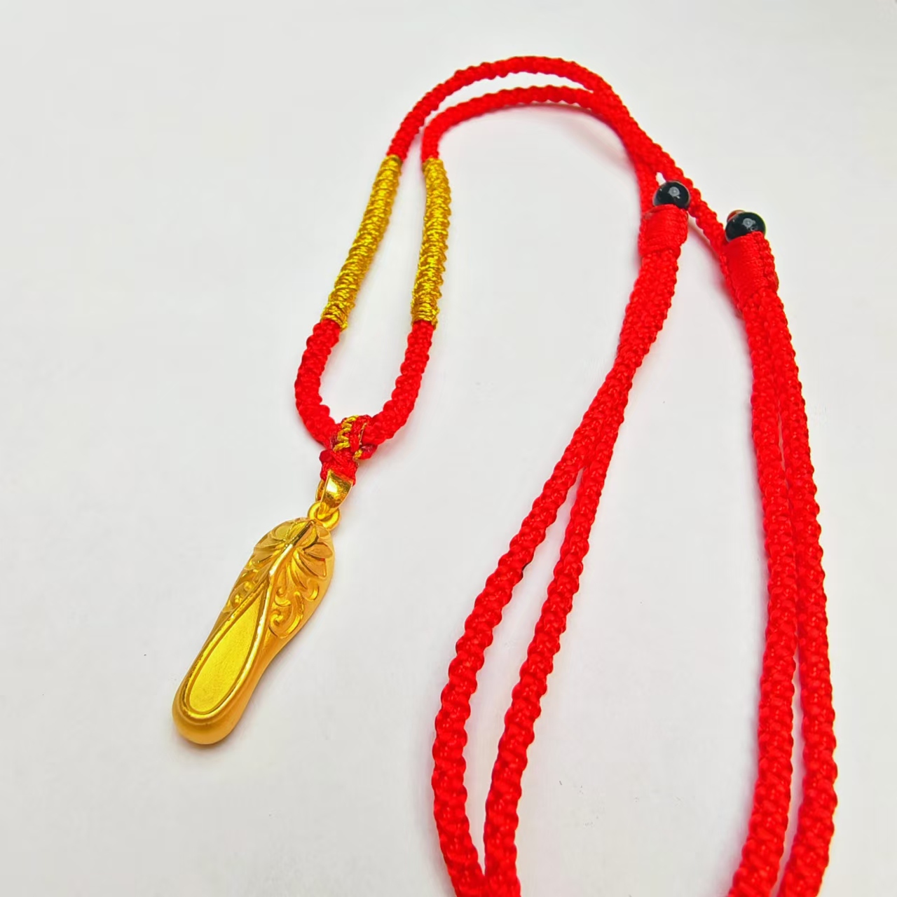 76#足金999黄金 5D硬金工艺 蝴蝶小金鞋红绳编织