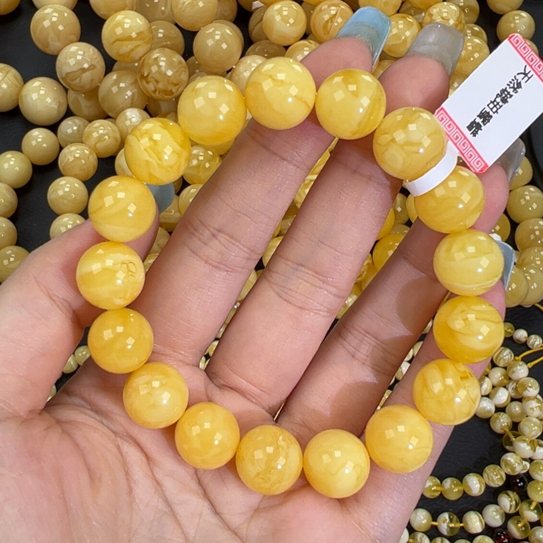 琥珀未镶嵌手链19.7黄白妖花