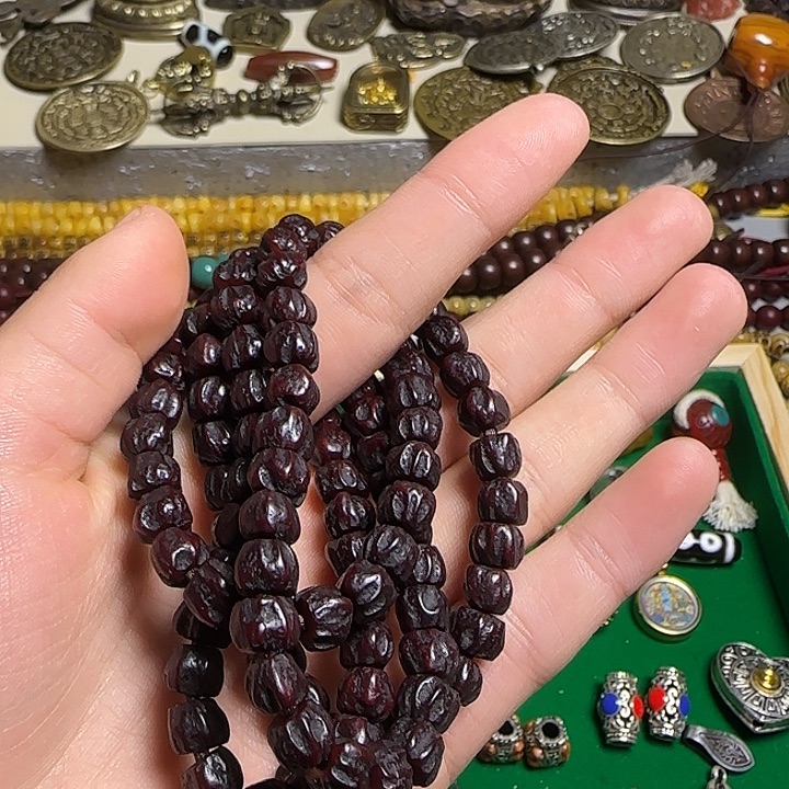 锁***丶非金属黑紫色百香籽