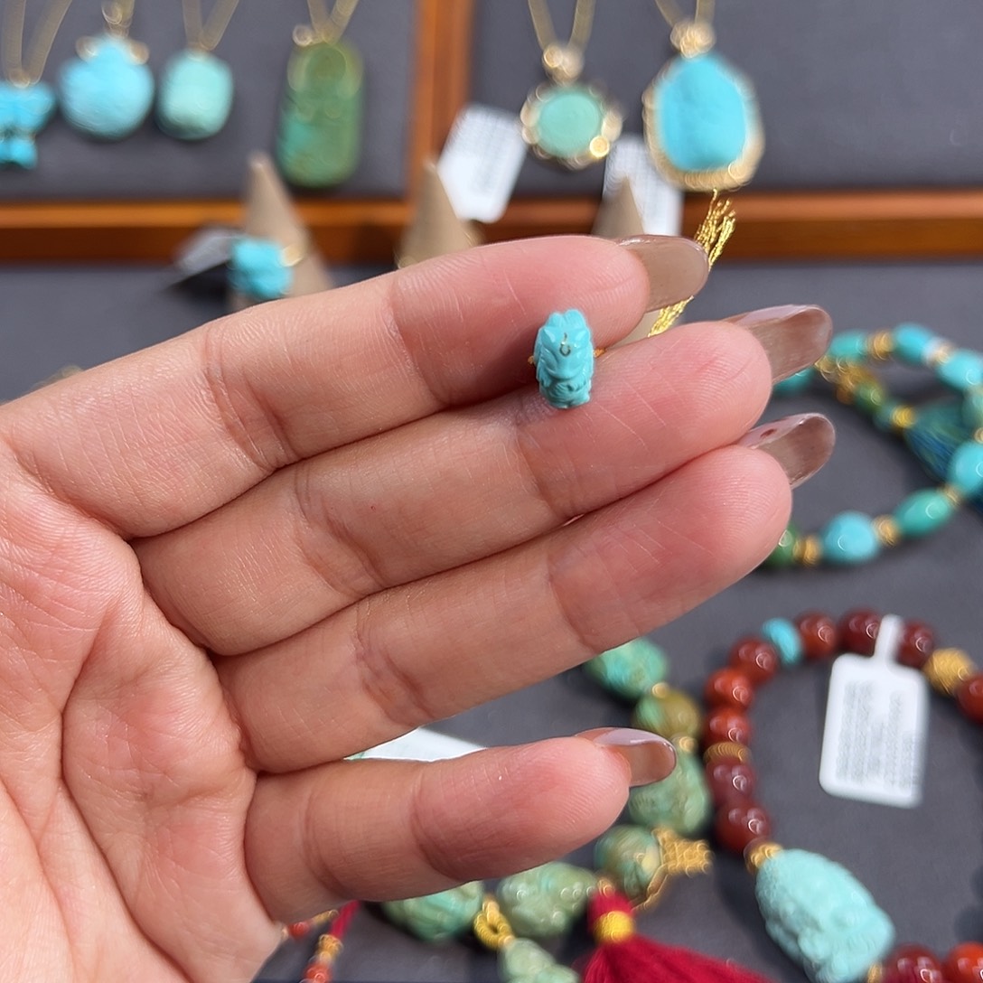 萍***p绿松石未镶嵌把件凤九墩子