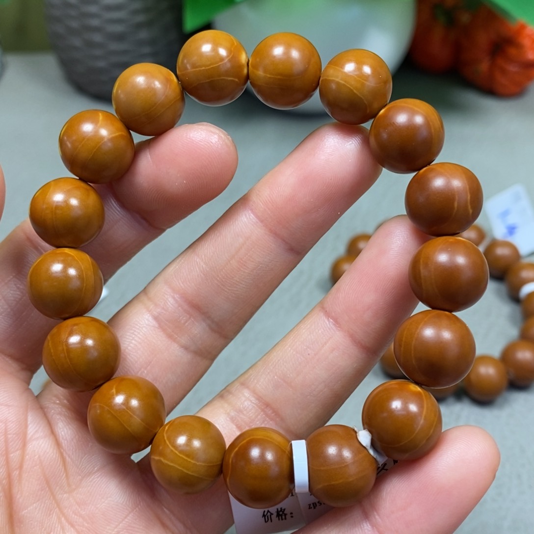 橄榄核吊坠正圆手串