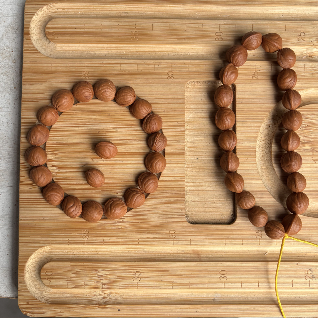 野桃核手串1.0CM20颗