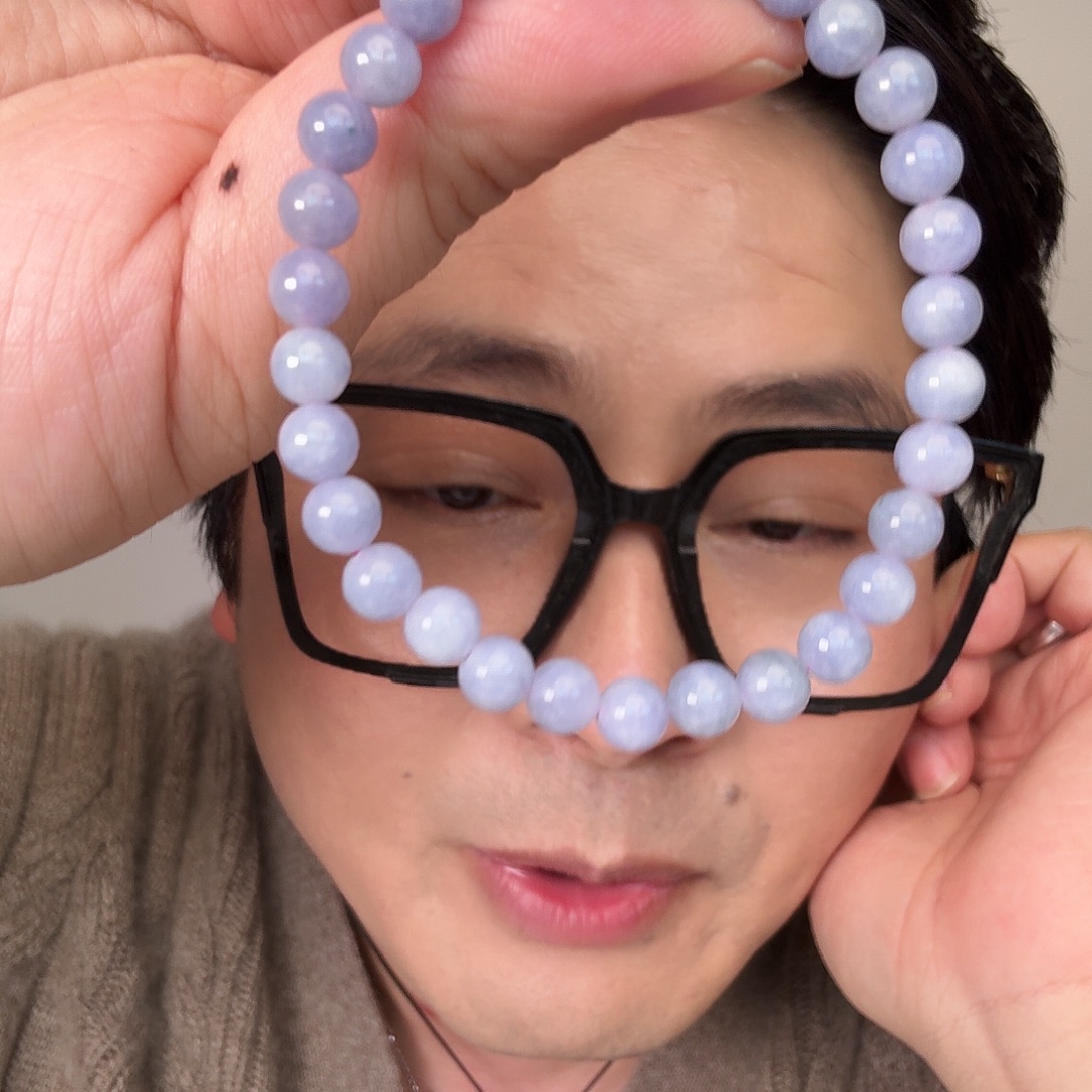 曲***扬翡翠未镶嵌颈饰一件