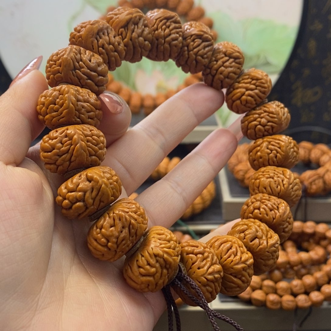 桃核手串龙纹桃核麒麟