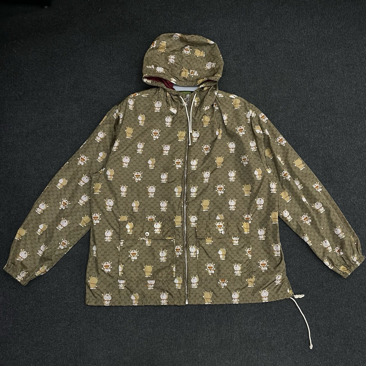 99新 GUCCI/古驰 联名哆啦A梦满印连帽冲锋衣外套/尺码48