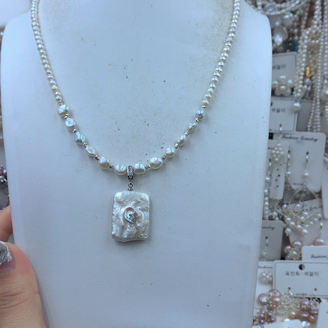 淡水珍珠银S925镶嵌耳饰