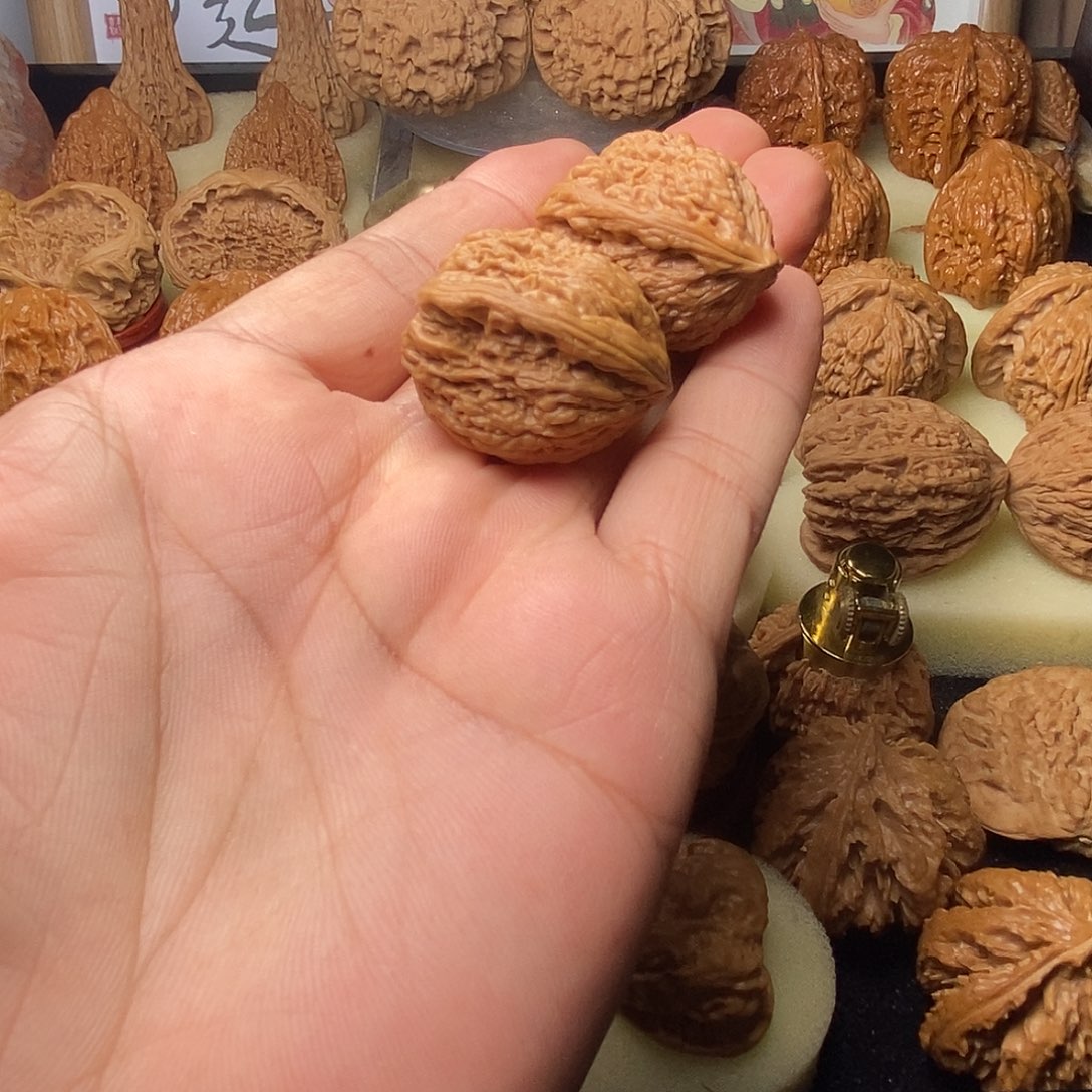 文玩核桃把件人**醒高炮