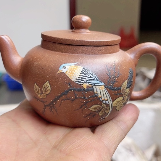 紫砂茶壶是的……是个