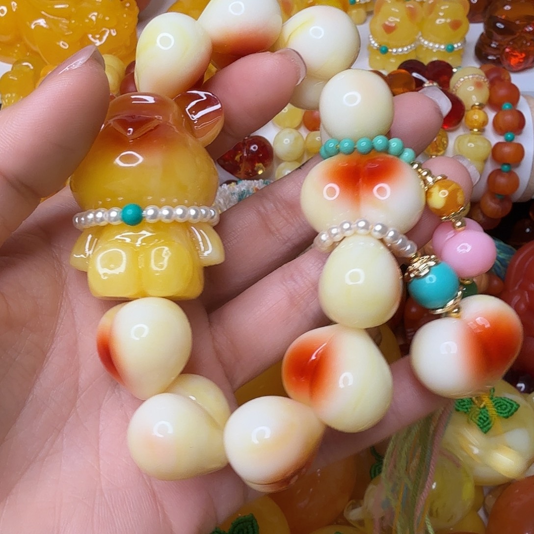 怡***琶非金属屁桃手持小熊