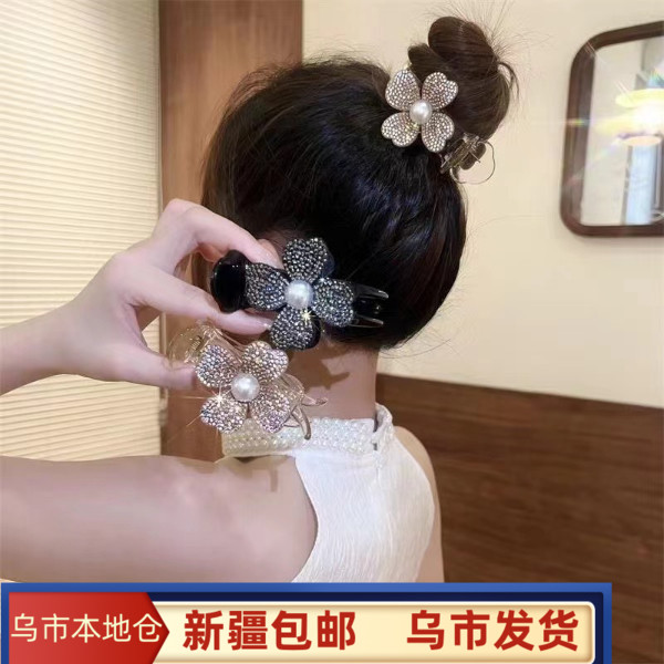 新疆包邮水钻四叶草丸子头高颜值抓夹高马尾固定神器鲨鱼夹头饰女