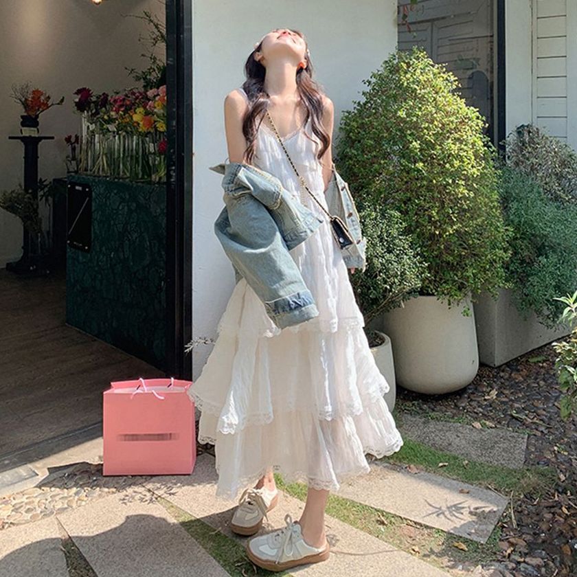 新款春季百搭蕾丝边吊带连衣裙女休闲度假风不规则蛋糕长裙
