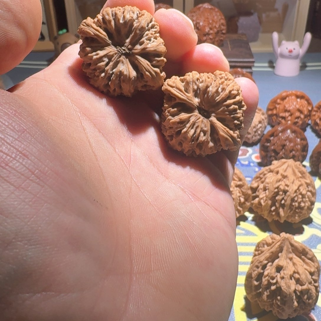 桃核把件完**烧南将石