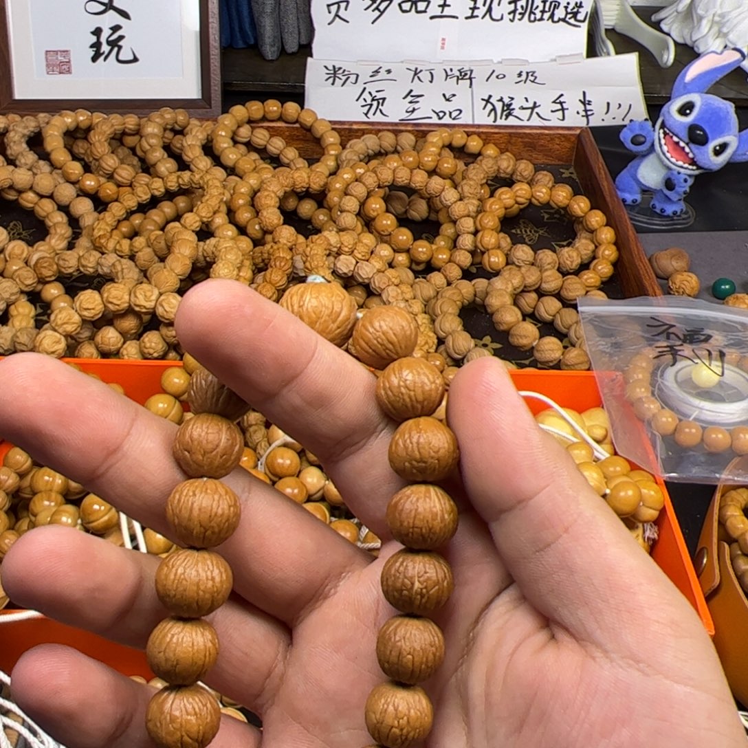 健****手串猴头核桃边度凤羽