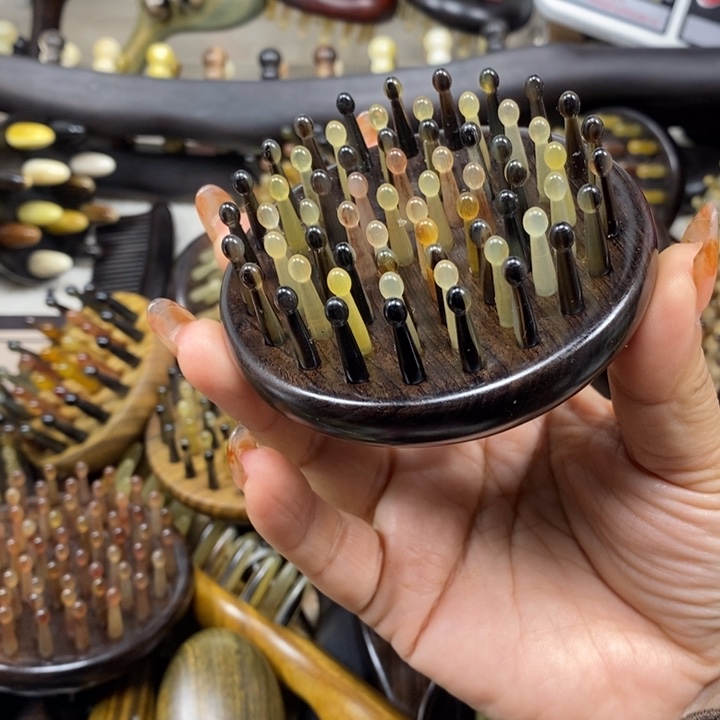 紫光檀64齿羊角按摩梳