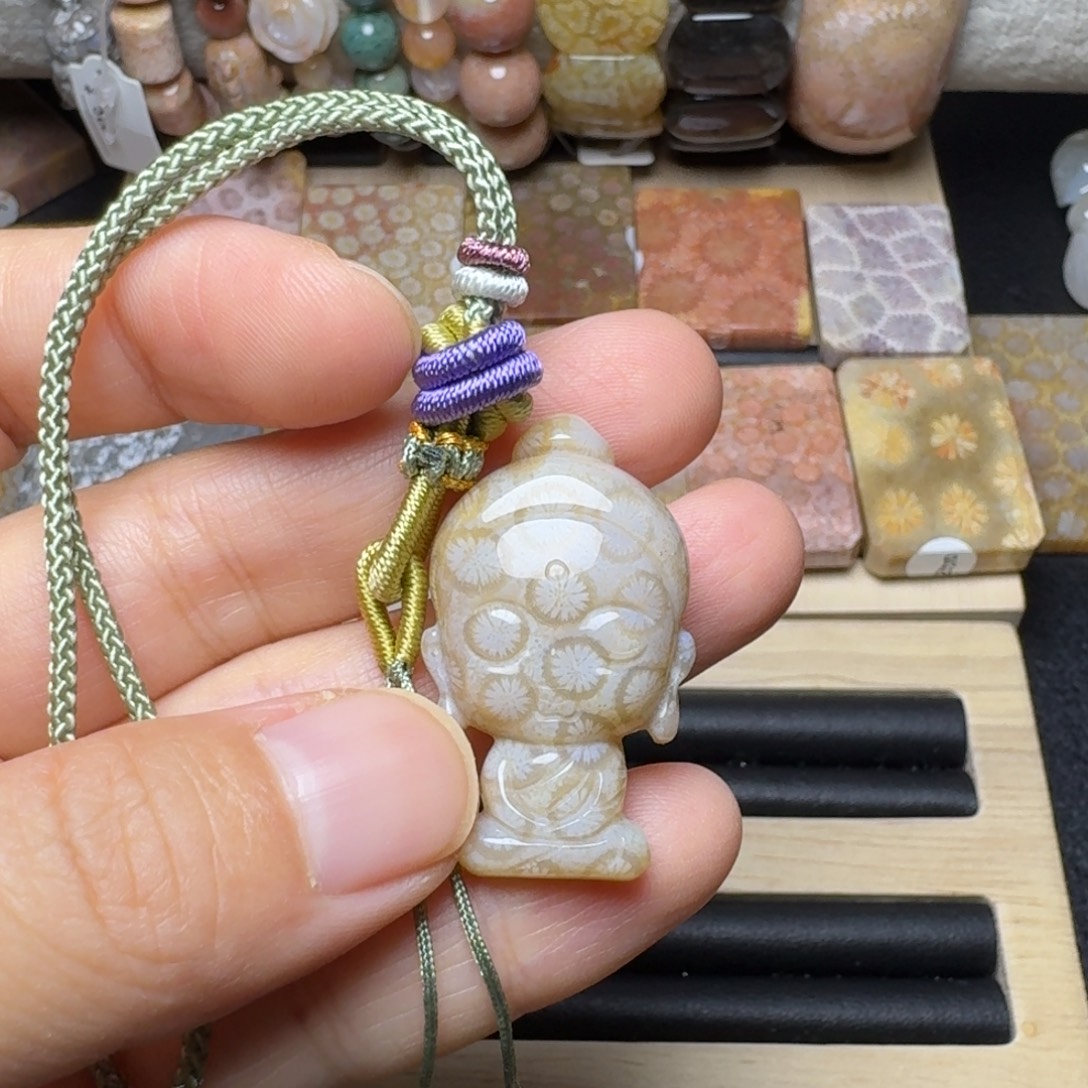 梦***F硅化玉未镶嵌宝宝佛